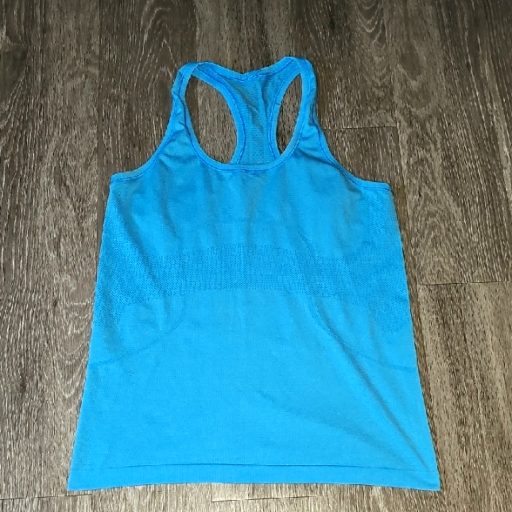 Lululemon SWIFTLY tank Top Sz 10. Womens Blue Tank Top.